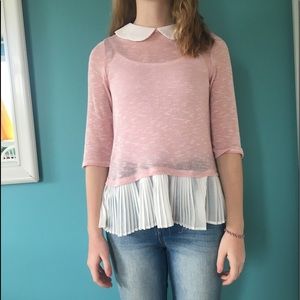 Light pink shirt with white collar and flair